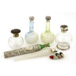 Nine assorted scent bottles of various forms,