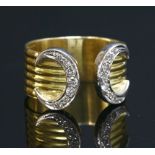 An 18ct gold torque style ring