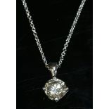 An 18ct white gold single stone diamond pendant,