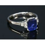 An 18ct white gold single stone sapphire ring,