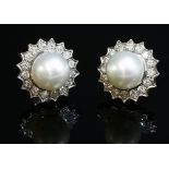 A pair of white gold South Sea cultured pearl and diamond cluster earrings