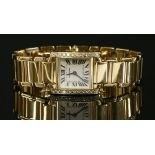 A ladies 18ct gold Cartier Tank Francaise quartz bracelet watch