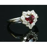 An 18ct white gold ruby and diamond cluster ring