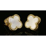 A pair of gold mother of pearl stud earrings,