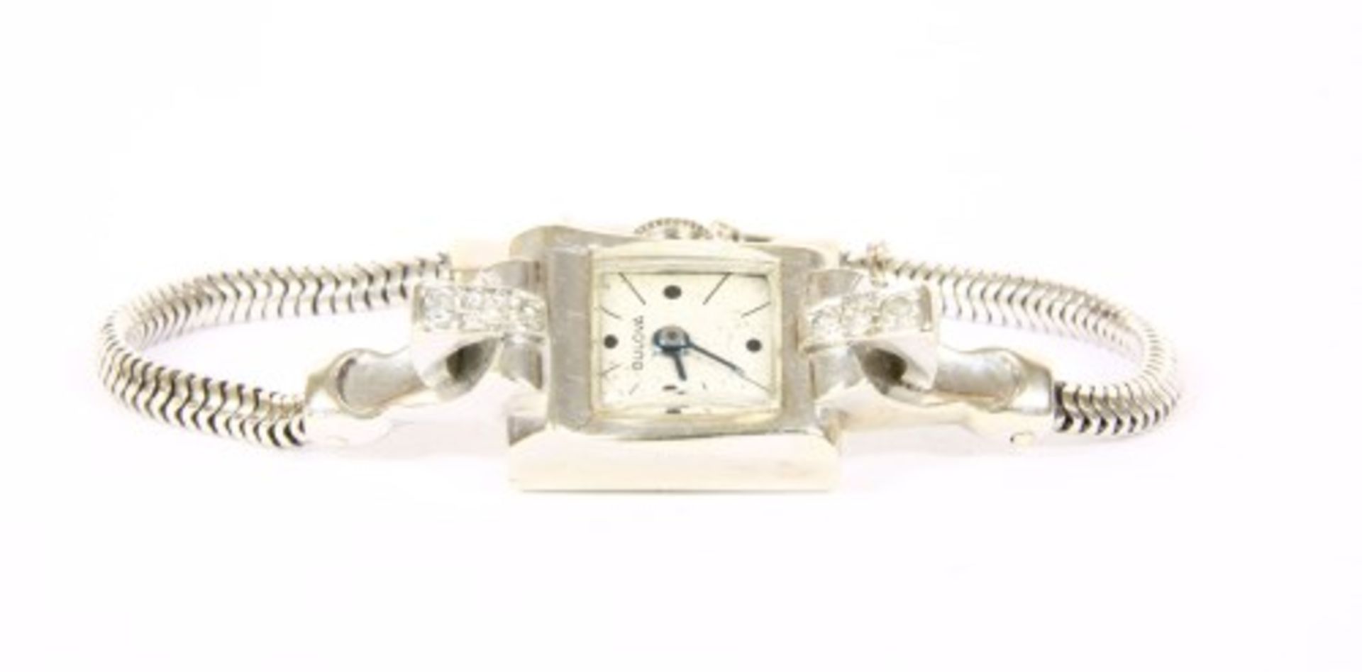 A ladies' white gold diamond set Bulova mechanical cocktail watch