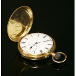 A gold Hunter side wind Swiss pocket watch