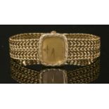 A ladies Baume & Mercier Genève mechanical bracelet watch,