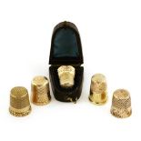 Five gold thimbles,