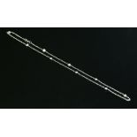 A white gold diamond set necklace,