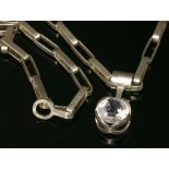 A sterling silver Swedish rock crystal pendant and chain or belt