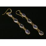 A pair of gold moonstone drop earrings