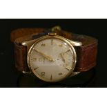 A gentlemen's 9ct gold Omega mechanical strap watch