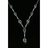 A white gold aquamarine and diamond necklace,