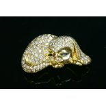 A gold diamond set novelty puppy brooch, attributed to David Morris,