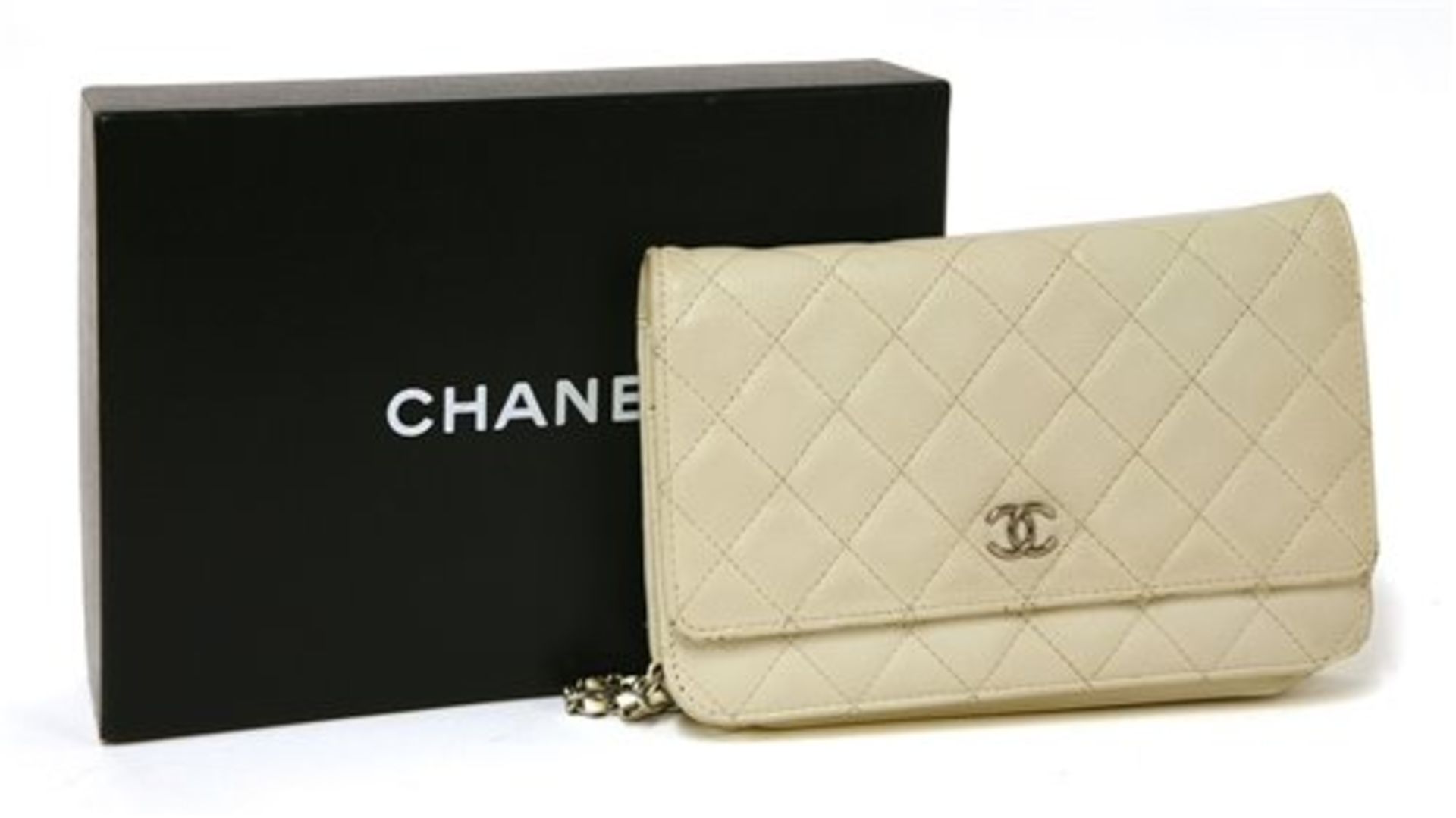 A Chanel cream caviar leather flap evening handbag