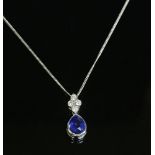 An 18ct white gold sapphire and diamond pendant,