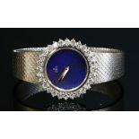 A ladies 18ct gold diamond set Ebel mechanical bracelet watch,