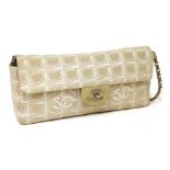 A Chanel New Travel chain flap handbag