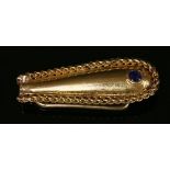 An 18ct gold single stone sapphire money clip