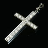 A white gold diamond set flat section Latin cross