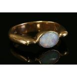 A 9ct gold single stone opal ring, by Christopher Wharton