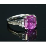 A platinum single stone sapphire ring,