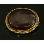 A Victorian gold garnet brooch