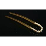 An Edwardian gold and diamond set hairpin or fourchere