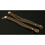 A pair of brown silk cord bracelets