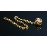 A French gold diamond set key chain,