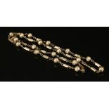 A 9ct gold hollow bead and hexagonal bar link chain