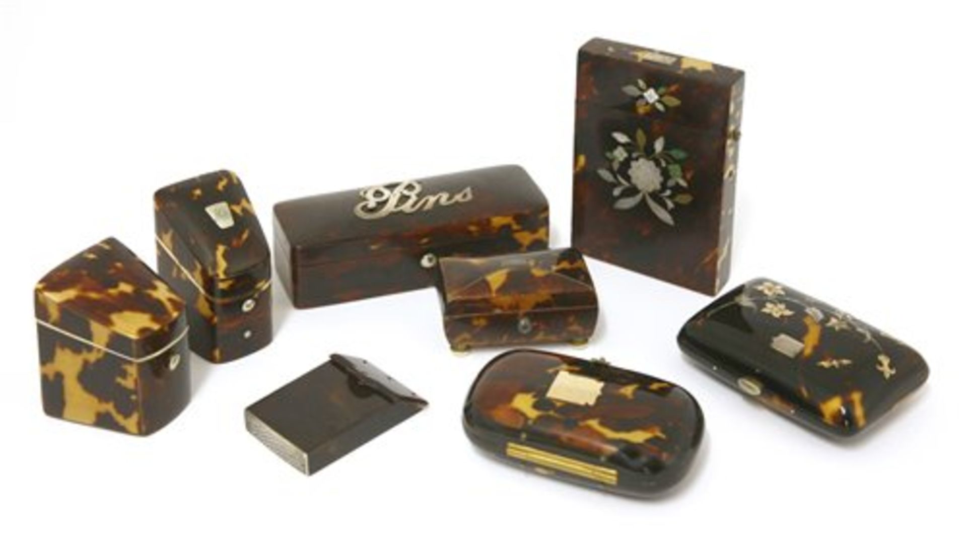 Eight assorted tortoiseshell boxes,