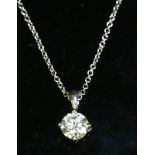 An 18ct white gold single stone diamond pendant,