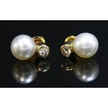 A pair of gold cultured pearl and diamond earrings