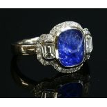 An 18ct white gold sapphire and diamond cluster ring,