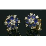 A pair of 18ct gold diamond and sapphire cluster earrings