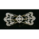 A French Belle Époque diamond set bow form brooch, c.1915,