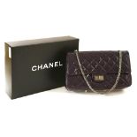A Chanel classic purple patent quilted leather Jumbo Accordian re-issue 2.55,