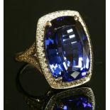 A platinum, tanzanite and diamond cluster ring