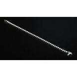 An Italian white gold diamond set line bracelet,