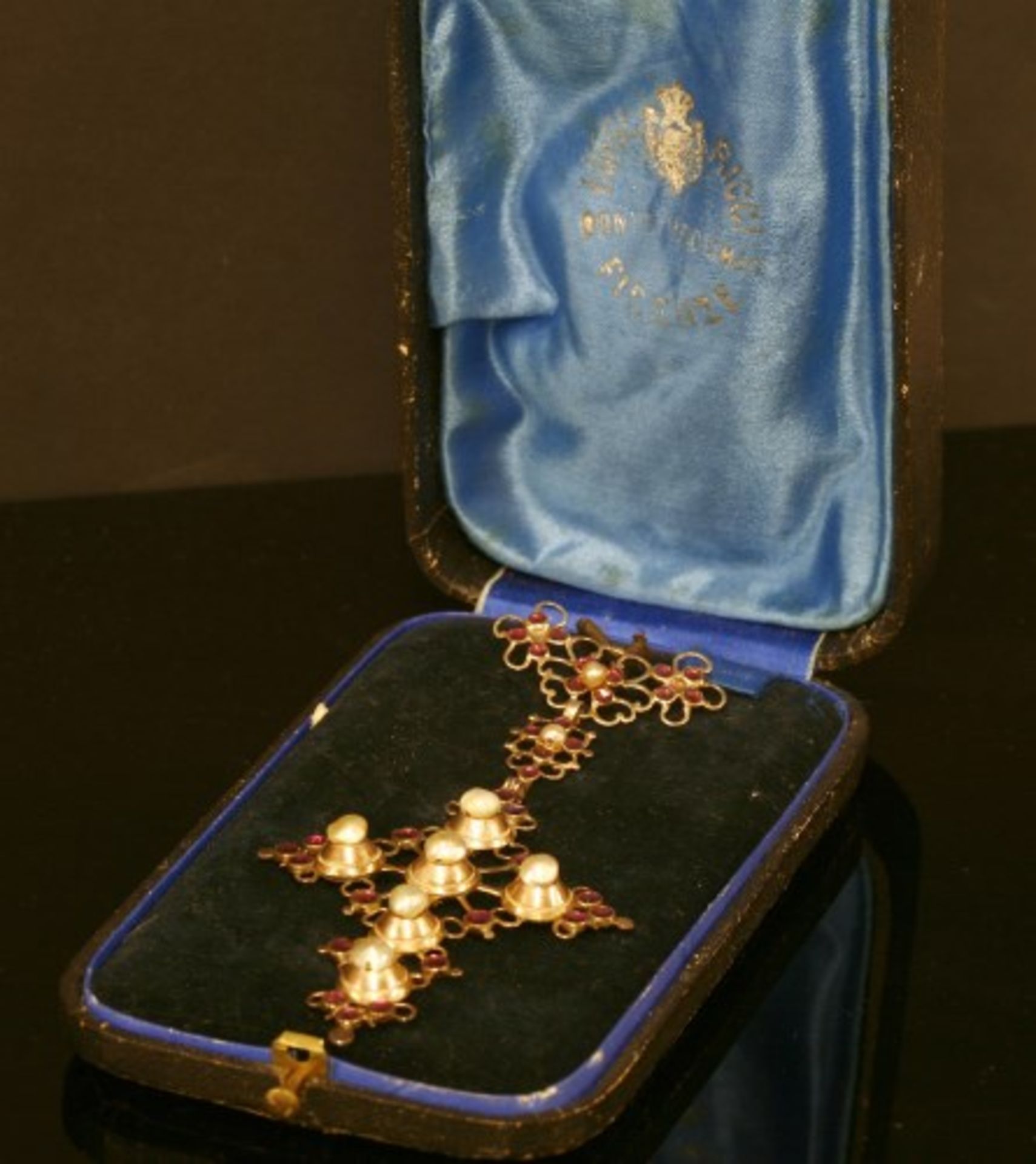 A Georgian gold garnet and pearl cross