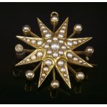 A late Victorian gold and split pearl star burst brooch