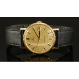 A gentlemen's 9ct gold Omega Genève mechanical strap watch