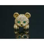 An 18ct gold emerald and diamond novelty teddy bear brooch,