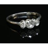 A graduated three stone diamond ring,