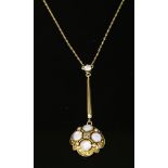 A late Victorian gold, diamond and opal Etruscan revival Edna May pendant,