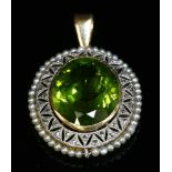 A Belle Époque peridot, diamond and seed pearl pendant