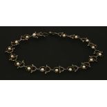 A cased sterling silver, 18ct gold and cultured pearl necklace, by Brett Payne,