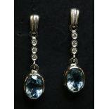 A pair of 18ct white gold aquamarine and diamond drop earrings