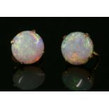 A pair of single stone opal earrings